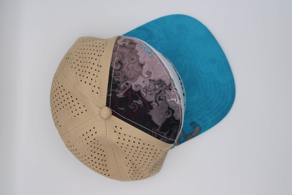 White, blue, tan 7 panel snapback hat - Arc Font